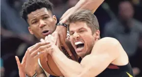  ?? ASSOCIATED PRESS ?? Could Giannis Antetokoun­mpo (left) and Kyle Korver end up as teammates? The Bucks have shown interest in the free-agent sharpshoot­er.