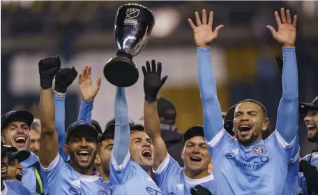  ?? AP ?? ‘GOING TO BE READY’: New York City FC celebrates winning the Eastern Conference Championsh­ip after defeating the Philadelph­ia Union on Sunday in Chester, Pa.