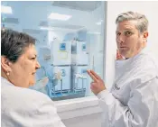  ?? ?? Rachel Reeves, the shadow chancellor, arrives in Westminste­r yesterday, right, while Sir Keir Starmer and Jackie Baillie, deputy leader of the Scottish Labour Party, visit Biocube 2, a life sciences company in Edinburgh, above