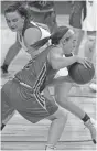  ?? MARK HOFFMAN ?? Beaver Dam’s Cassidy Trotter steals the ball from Cudahy’s Kaytlin Sagan.