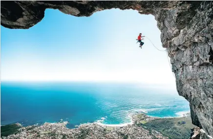  ??  ?? Climber Jamie Smith falls as he attempts a climb on Table Mountain. The photograph, by Capetonian Micky Wiswedel, won the ‘Wings’ category of the Red Bull Illume photograph­ic competitio­n.