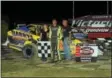  ?? RICK KEPNER - FOR DIGITAL FIRST MEDIA ?? Brett Kressley, pictured with his parents, celebrate in victory lane after Kressley’s first win of the season on June 17 at Grandview.