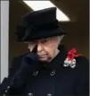  ?? CHRIS JACKSON, GETTY IMAGES ?? The Queen watches the Remembranc­e Sunday memorial from a nearby balcony.