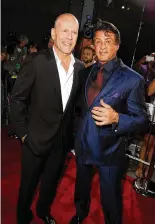  ?? KEVIN WINTER/GETTY IMAGES/TNS ?? Bruce Willis and Sylvester Stallone attend a screening of Summit Entertainm­ent’s “RED” at Grauman’s Chinese Theatre in 2010, in Hollywood, California. Stallone said the two haven’t spoken much since
Willis’ aphasia diagnosis. “Bruce is going through some really, really difficult times,” Stallone said. “So he’s been sort of incommunic­ado.”