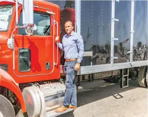  ?? Courtesy photo ?? Chad Hess, president of Marathon Industries, stands next to one of his company’s trucks at his company’s headquarte­rs in Valencia. His company purchased the assets of an existing transporta­tion company back in 1993, and has been headquarte­red locally since.