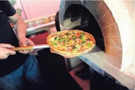  ?? MELISSA FERNÁNDEZ ?? La pizza estuvo entre los bienes que mostraron mayor efecto en el aumento de la inflación en el pasado mes de julio.