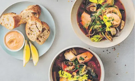  ?? KEVIN CLARK ?? Chef Ned Bell showcases a variety of sustainabl­e seafood in his West Coast bouillabai­sse.