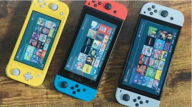  ?? ?? Top: Various models of the Nintendo Switch, which CNET rates as the very best hand-held gaming console. SCOTT STEIN/