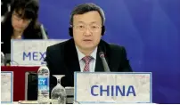  ?? AP ?? Chinese deputy trade minister Wang Shouwen speaks during a Press conference in Hanoi on Sunday. —