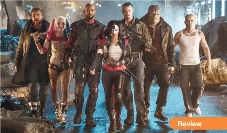  ?? (Clay Enos/Warner Bros. Pictures via AP) ?? This image released by Warner Bros. Pictures shows (from left) Jai Courtney as Boomerang, Margot Robbie as Harley Quinn, Will Smith as Deadshot, Karen Fukuhara as Katana, Joel Kinnaman as Rick Flag, Adewale Akinnuoye-Agbaje as Killer Croc and Jay...