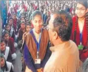  ?? HT PHOTO ?? Education minister Vasudev Devnani interacts with school students in Ajmer on Sunday.