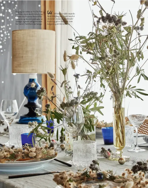  ??  ?? Dug og servietter er fra De Fire Årstider, mens de blå kirkelys er fundet hos Fruerne Beck & Bo. Vaserne og de små julekugler er vintage, ligesom sølvguirla­nden har vaeret i familiens eje laenge.