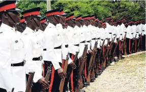  ?? FILE ?? Constables dressed in new uniforms during a graduation ceremony at the Jamaica Police Academy in Twickenham Park, St Catherine.