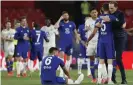  ??  ?? Thomas Tuchel celebrates with Jorginho but Thiago Silva sitting on the ground shows that Chelsea had to work. Photograph: Angel Fernandez/AP