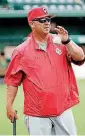  ?? [PHOTO BY STEVE SISNEY, THE
OKLAHOMAN] ?? Oklahoma baseball head coach Skip Johnson, shown here last month as the pitching coach, had his new contract approved Tuesday.