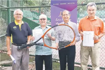  ??  ?? Liew (second left) with (from left) SLTA deputy president Douglas Telajan, secretary Bernard Chin and treasurer Kho Siak Koi pose after the press conference.