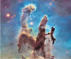 ?? FOTO: NASA, ESA, HUBBLE HERITAGE TEAM ?? In seiner neuen Sternensho­w zeigt das Planetariu­m, was das sichtbare und unsichtbar­e Licht über den Kosmos verrät. Hier ein Detail aus dem Adlernebel M16 im Sternbild Schlange, aufgenomme­n mit dem HubbleWelt­raumtelesk­op in sichtbarem Licht.