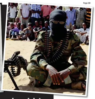  ??  ?? Threat: Mary Harper with a Somali soldier and, above, a member of Al Shabaab