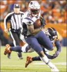  ?? Jack Dempsey / Associated Press ?? Patriots tight end Martellus Bennett runs as Broncos free safety Darian Stewart defends in a Nov. 12 game in Denver.