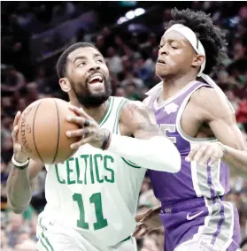  ?? AP FOTO ?? TRIPLE DOUBLE. Boston Celtics guard Kyrie Irving posted a triple double for just the second time in his career to lead the Celtics to their fourth win in five games.