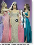  ?? PHOTO BY J. GERARD SEGUIA ?? The new Bb. Pilipinas Internatio­nal 2023 (center) was crowned by Miss Internatio­nal 2022 Jasmin Selberg (left) and Bb. Pilipinas Internatio­nal 2022 Nicole Borromeo.