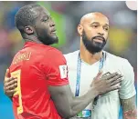  ??  ?? Belgium’s French coach Thierry Henry with striker Romelu Lukaku.