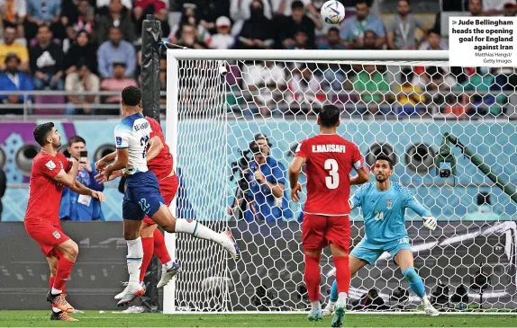  ?? Matthias Hangst/ Getty Images ?? Jude Bellingham heads the opening goal for England against Iran