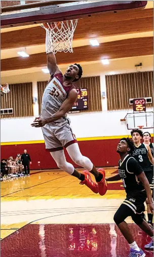  ?? JOSE QUEZADA — HUMEDIA FOR TIMES-STANDARD ?? The Corsairs’ Jon Nchekwube dunks the ball during Redwoods’ 65-62win over Butte earlier this season. Nchekwube will need to be at his best to combat the size of Cosumnes River.