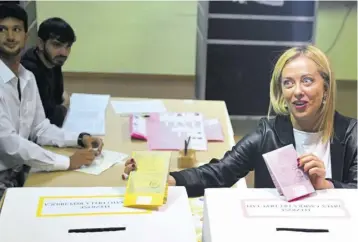  ?? (Photo: AFP) ?? ROME, Italy — Leader of Italian far-right party Fratelli d’italia (Brothers of Italy), Giorgia Meloni casts her vote at a polling station on September 25, 2022 in Rome, as the country holds its legislativ­e election.