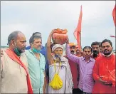  ?? HT ?? VHP office bearers with water and soil from the holy Sangam on ■
Wednesday.