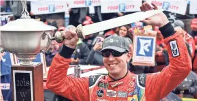  ?? MICHAEL SHROYER/USA TODAY SPORTS ?? Kyle Busch celebrates winning the Food City 500 at Bristol Motor Speedway, his seventh victory at the track.