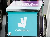  ?? (AP) ?? In this file photo, a Deliveroo logo on a bicycle in
London. British regulators said on Dec 27, they are launching a full-scale investigat­ion of Amazon’s plan to purchase a stake in Deliveroo to determine if it would dampen competitio­n.