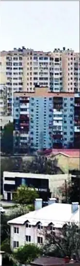  ?? ?? ATTACK: Smoke billows from an Odessa apartment block after it was hit by a Russian missile