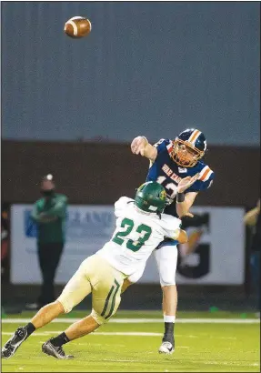  ?? (Special to NWA Democrat-Gazette/David Beach) ?? Reagan Birchfield (left) of Alma pressures Carter Hensley of Rogers Heritage.