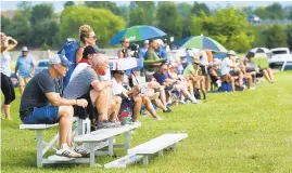  ??  ?? Friends and family watch the lacrosse teams play in Upper Macungie.