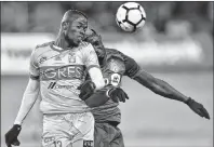  ?? AP PHOTO ?? Toronto FC defender Chris Mavinga, right, and UANL Tigres forward Enner Valencia battle for the header during CONCACAF Champions League quarter-final action n Toronto on Wednesday, March 7.