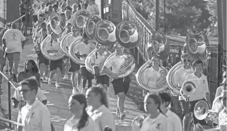 ?? ADAM CAIRNS/COLUMBUS DISPATCH ?? The Pickeringt­on Central High School marching band will perform at the Pickeringt­on Lions Labor Day Parade and Fish Fry event.
