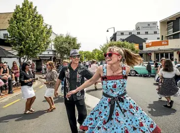  ?? ?? Aaron and Nicky Marshall, of the Top of the South Rock and Roll club, dance at the Street Hop yesterday.