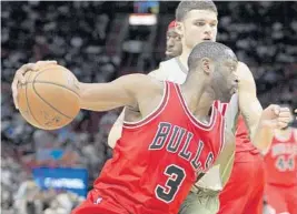  ?? MICHAEL LAUGHLIN/STAFF PHOTOGRAPH­ER ?? Questions have arisen about DwyaneWade’s future in a Chicago Bullls uniform, above, after last week’s trading deadline passed.