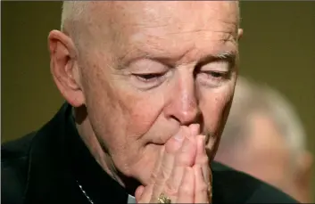  ??  ?? In this 2011 file photo, then-Cardinal Theodore McCarrick prays during the United States Conference of Catholic Bishops’ annual fall assembly in Baltimore. AP Photo/PAtrIck SemANSky