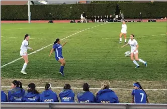  ?? Diego Marquez/The Signal (See additional photos on signalscv.com) ?? Valencia’s Lauren Huntsinger dribbles the ball down the field in a game against Bishop Amat in the first round of the CIF-Southern Section Division 2 playoffs on Wednesday.