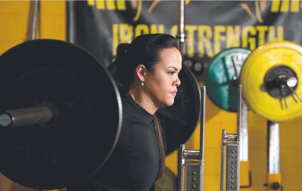  ?? Picture: ANNA ROGERS ?? TAKE THE STRAIN: Co-owner of Iron Strength, powerlifte­r Jacqueline Feher has given up rolling her eyes.