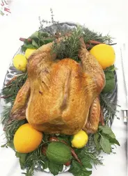  ?? (Special to The Commercial) ?? Cooks may want to purchase extra oranges, lemons, limes, thyme and rosemary for garnishes with a brined turkey.