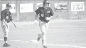  ??  ?? Pictured Left: Gabriel Baeza rounds the bases as he hit the walk-off game winning Home Run against Herford giving the Steers a 9 to 8 victory. Pictured Right: The Steers Surround the plate to welcome Baeza home celebratin­g the game winning Home Run.