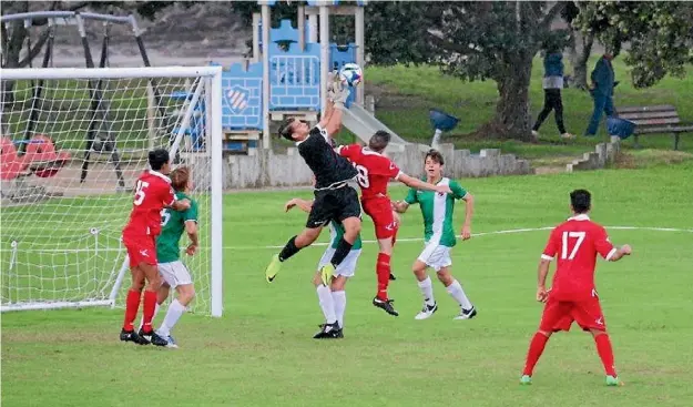  ?? MARTIN WILLIAMS ?? Coast goalkeeper Joshua Precious goes up for another save against Tauranga.