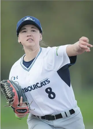  ?? DARRYL DYCK/THE CANADIAN PRESS ?? Claire Eccles throws a pitch at the University of British Columbia in Vancouver last week. The Victoria HarbourCat­s announced Tuesday that the 19-year-old from Surrey, B.C., will join the club for the 2017 West Coast League season. She will be the...