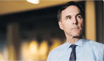  ?? CHRISTOPHE­R KATSAROV/THE CANADIAN PRESS ?? Economists have advised Finance Minister Bill Morneau to focus on reducing deficits to prepare for a slowdown in growth and amid worries over NAFTA and U.S. tax cuts.