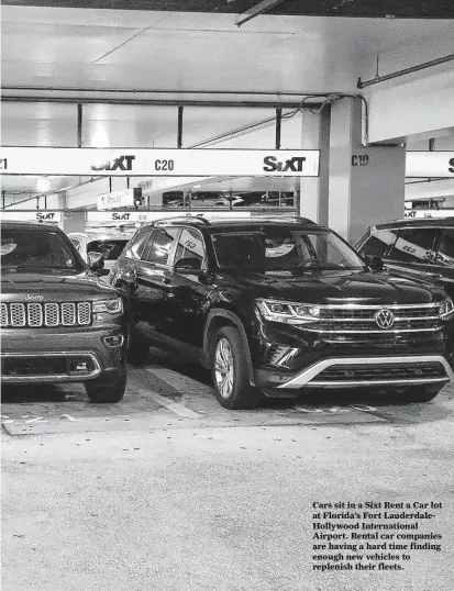  ?? John McCall / Tribune News Service ?? Cars sit in a Sixt Rent a Car lot at Florida’s Fort Lauderdale­Hollywood Internatio­nal Airport. Rental car companies are having a hard time finding enough new vehicles to replenish their fleets.