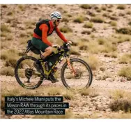  ?? ?? Italy’s Michele Miani puts the Mason RAW through its paces in the 2022 Atlas Mountain Race