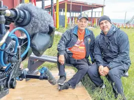  ?? ?? Qalipu member Calvin White and producer Wendell Collier on set in Flat Bay.